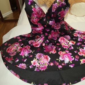 Black floral high low mini dress.